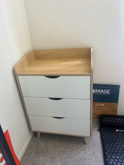 Bed side table with 3 drawers