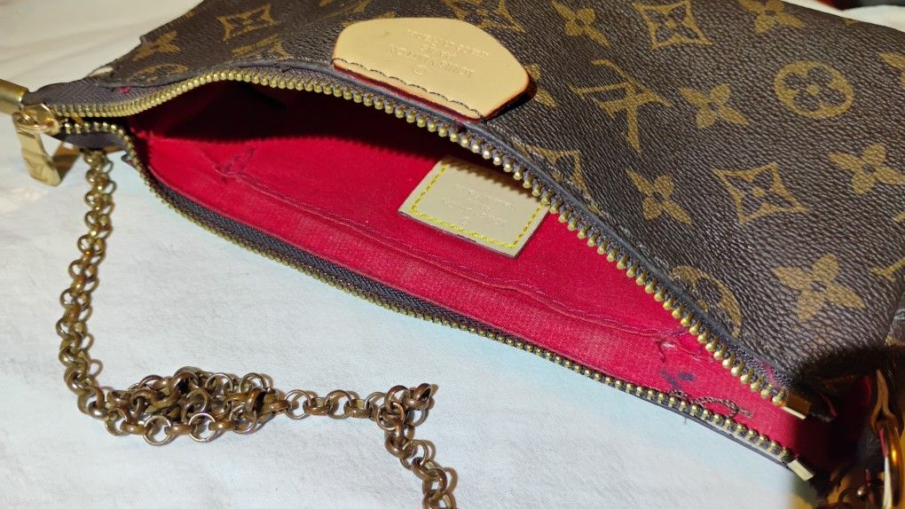 Authentic Louis Vuitton accessory bag
