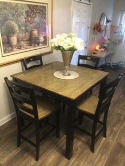Ashley Furniture counter height solid wood dining table set with 4 chairs