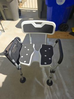 Adjustable shower chair with mesh bag