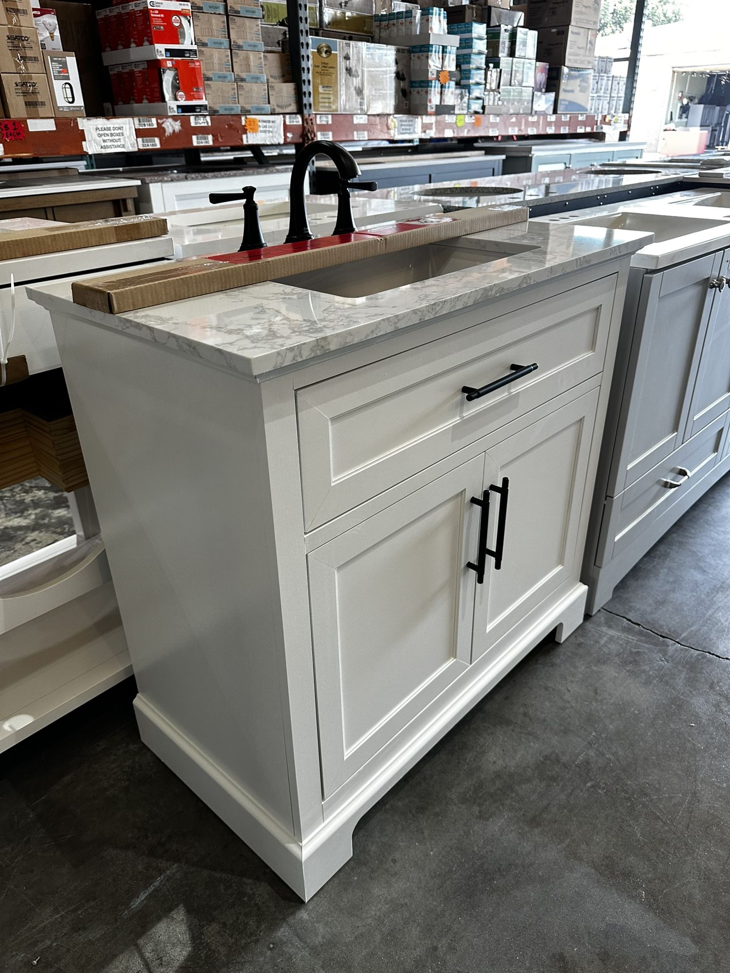 Home Decorators Collection Doveton 36 in. Single Sink Freestanding White Bath Vanity with White Engineered Marble Top (Fully Assembled)