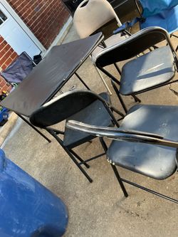 Many folding chairs ( 2 are a little rip in one side) a folding small table with a cut in the back(all for $40)