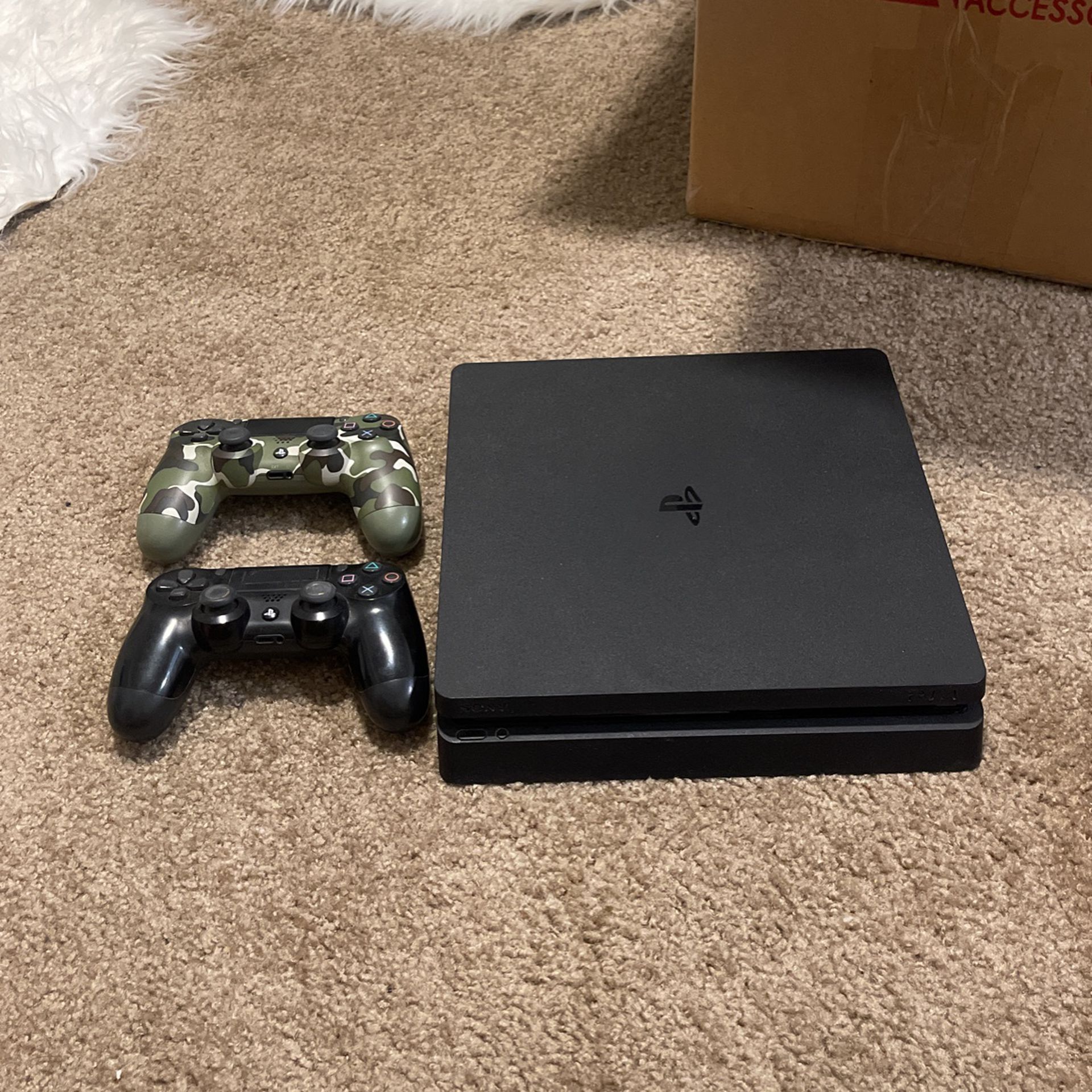 PS4 with 2 controllers + cords