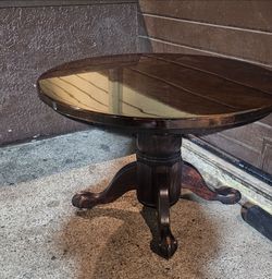 Round Pedestal Wood Table with Claw Feet heavy-duty try to pick up today