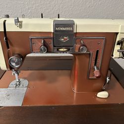 Antique Kenmore 1956 sewing machine in cabinet