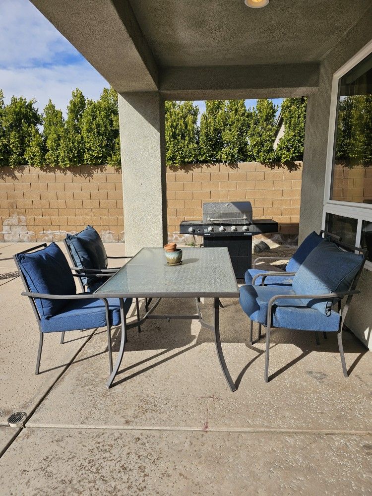Patio Table Set with Charbroil BBQ pit included.