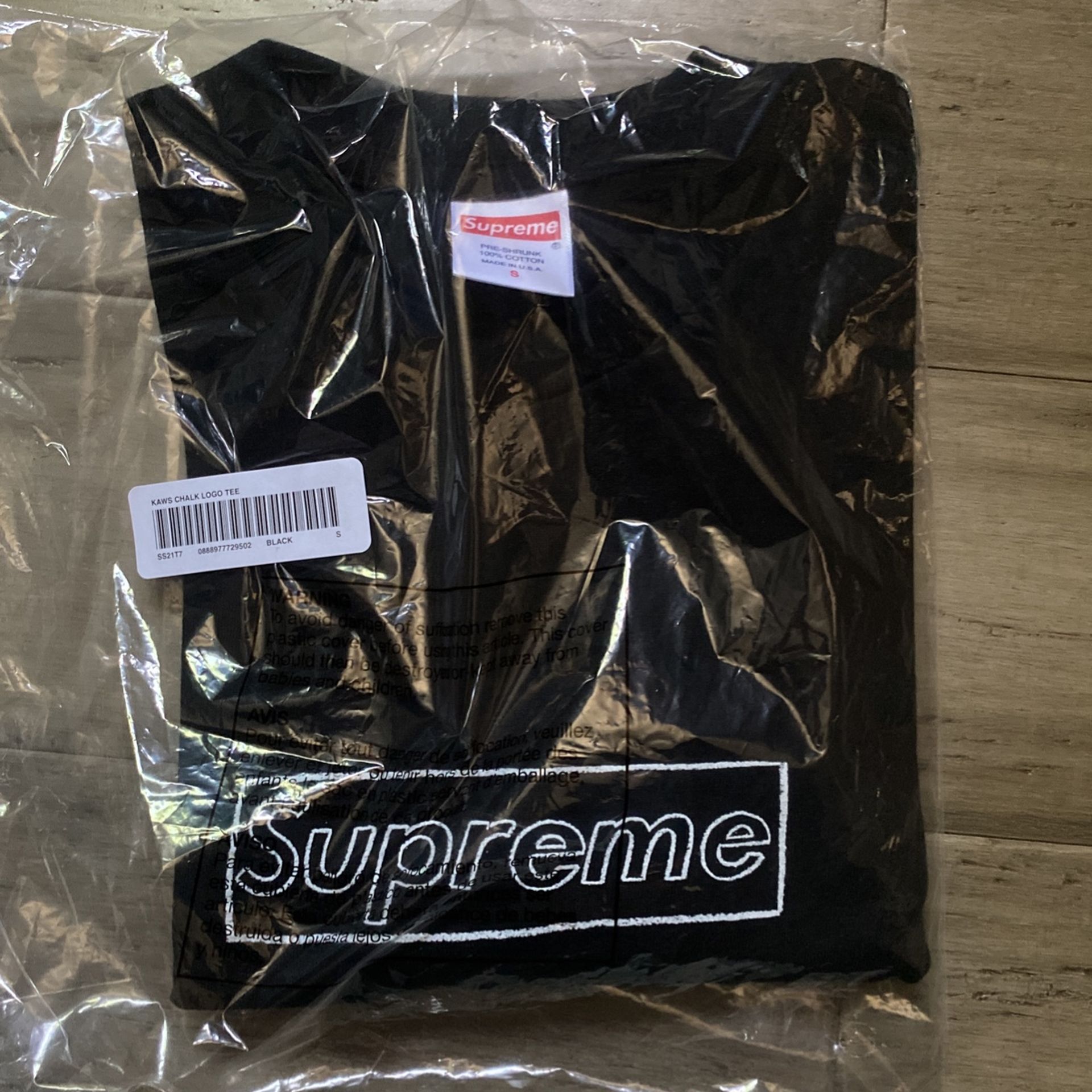 supreme kaws box logo