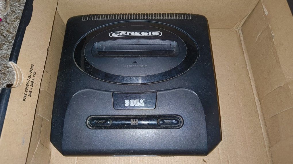 Sega Genesis With Games and Two Nintendo DS