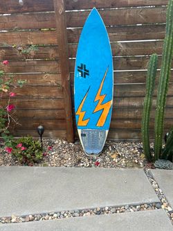 5’3 spray painted custom surfboard around 21 liters