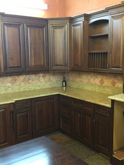 Kitchen cabinets Dynasty By Omega Kitchen Cabinets and Granite