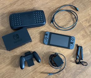 Nintendo Switch V1 HAC-001, Extremely Low Serial (XAW1000), Unpatched, Mint, Premium Games Pack