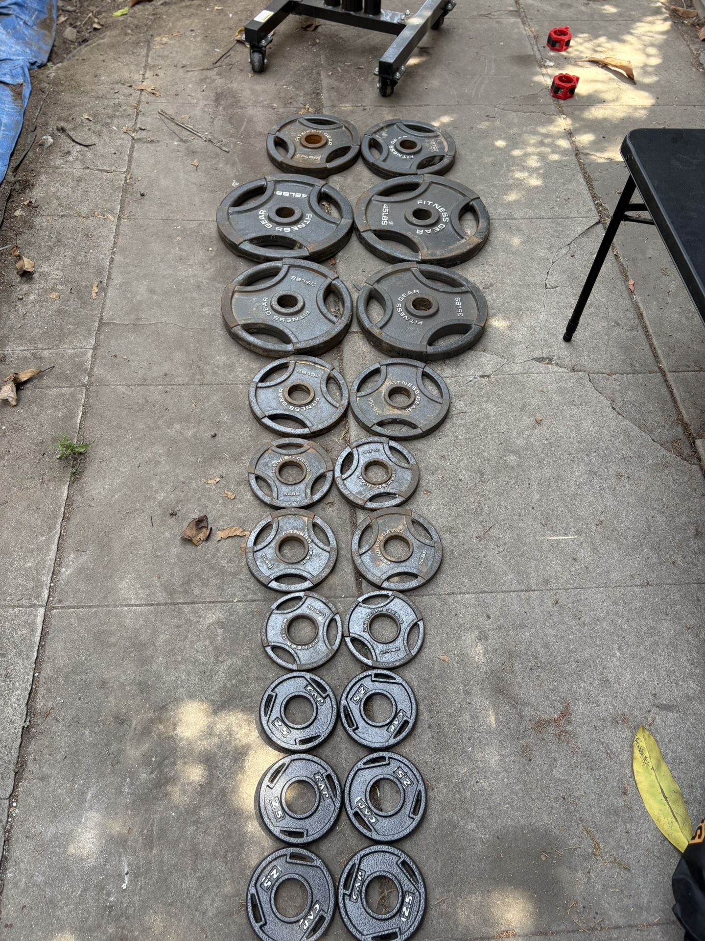 barbell, plates, and plate tree