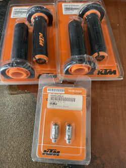 KTM Grips And Fork Bleeder Valves
