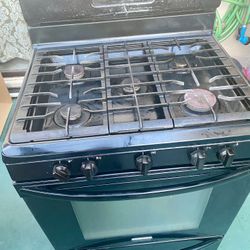 Gas Range With Convention Oven And Matching Over The Range Microwave