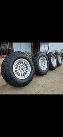 17" KMC w/ 33"  Goodyear MT tires