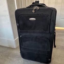 Samsonite carry on luggage size 22’ color black 20$