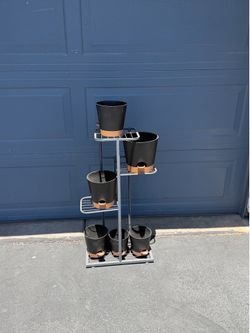 Plant stand four tier/6 pots Plant stand four tier/6 pots