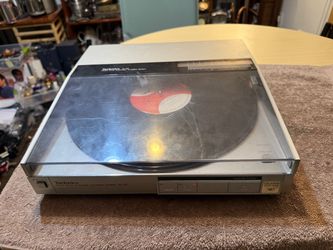 The Technics SL-Q5 Linear Tracking Turntable is a high-quality home audio component designed for vinyl record enthusiasts. Made by Technics, a reputab