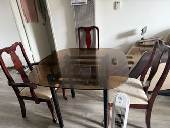 MOVING SALE - Glass-top dining table + 3 wooden chairs