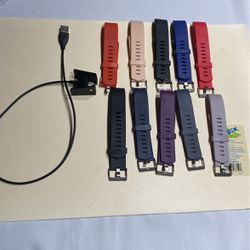 Fitbit charge two plug and 10 bands $20