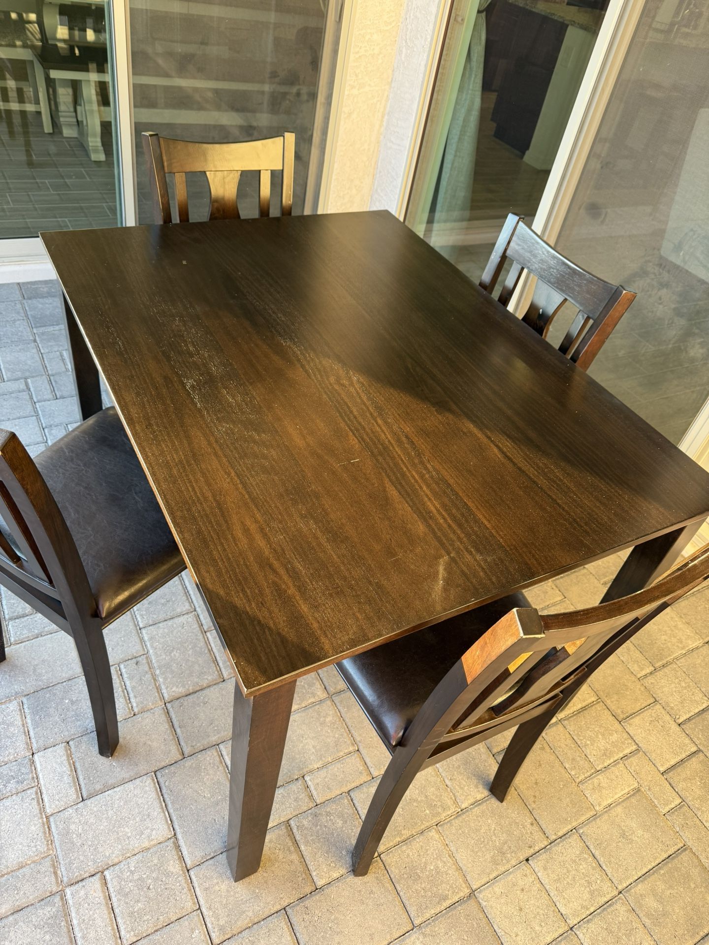 Dining Table And Four Chairs