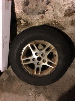 99/04 Jeep cherokee rim with tire