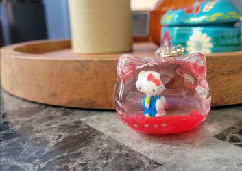 Sanrio Hello Kitty Clear Dome Keychain with Red Base