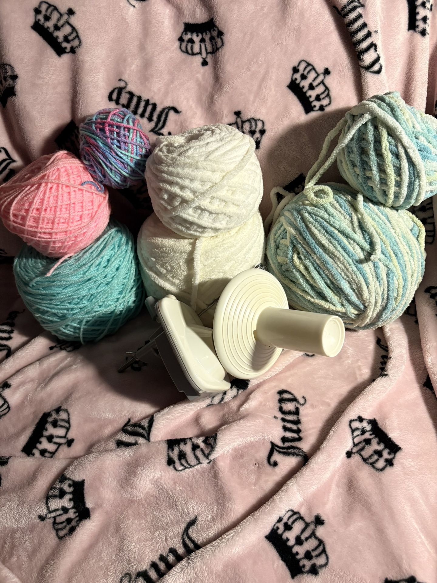 Lot of yarn and yarn cake roller