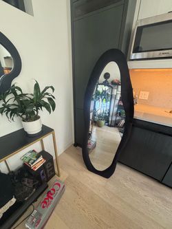 Abstract floor mirror