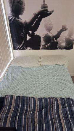 Completed bed set(metal frame, a box spring, and a mattress) with pillows blanket and bed sheet