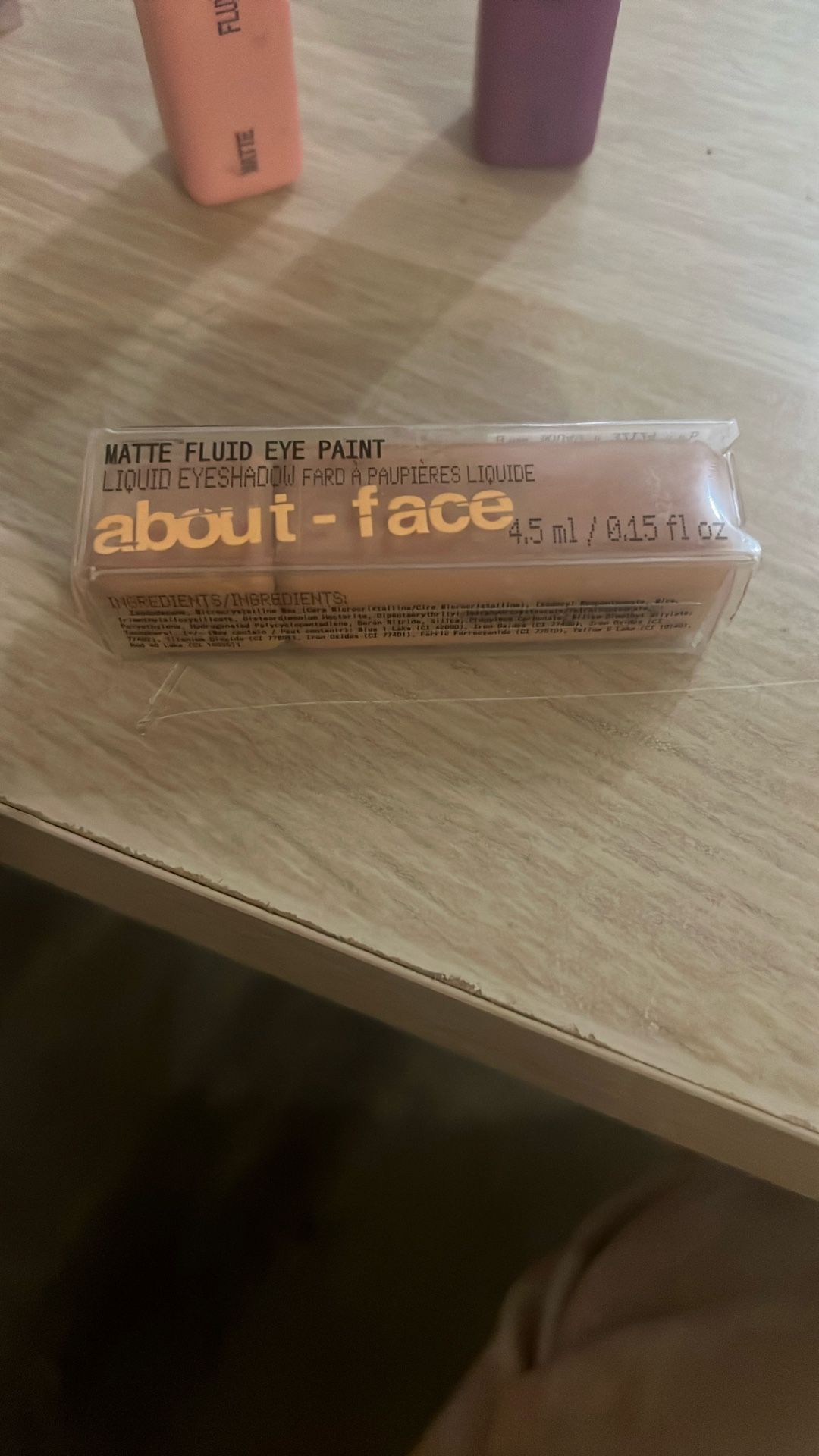 About Face Matte Fluid Eye Paint Light Transcending