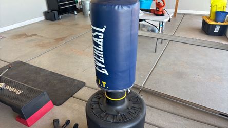 Standing kickboxing bag with gloves