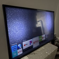 65’ Samsung Smart Tv With A Dim Light
