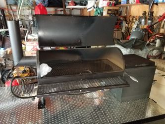 Bbq pit with trailer asking 2000 or best offer.