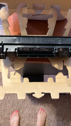 2HP printer cartridges. I brand new and the other one has one 20 copies printed off