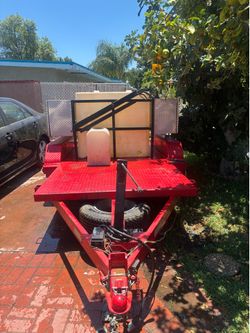 12ft flatbed trailer. 300 gal tank,