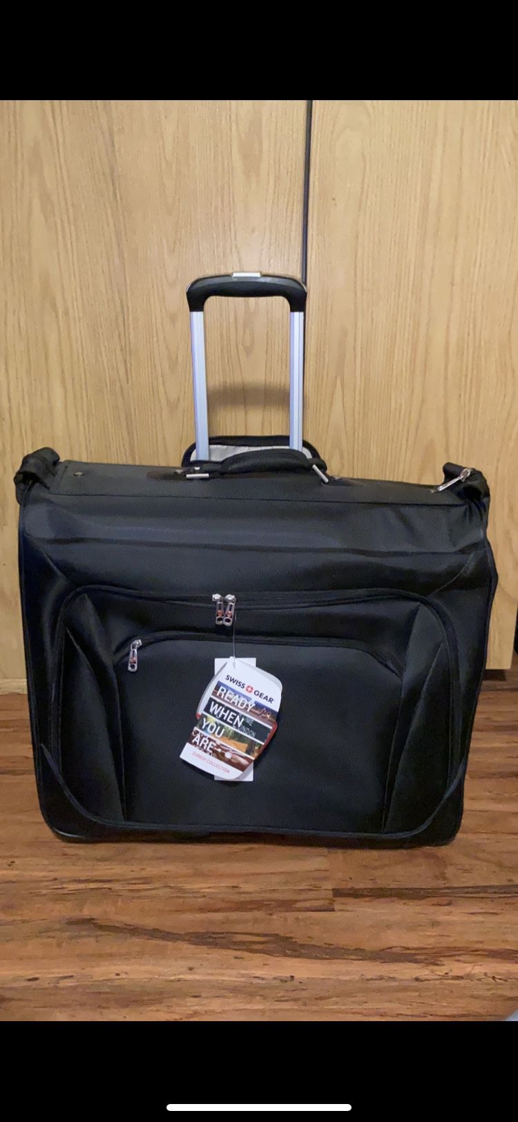  SWISS GEAR PREMIUM ROLLING LUGGAGE/ BAG WITH WHEELS