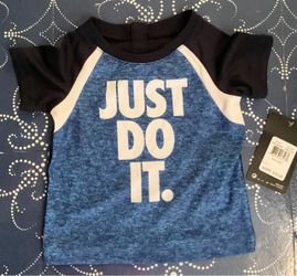 New Nike shirt-size 6/9months