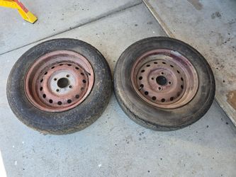 2 Triumph 4 Lug Wheels (Tires No Good)