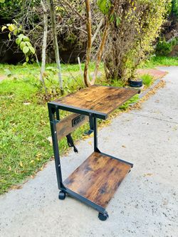 Wood C Shape End Side Table with Charging Station Outlet USB Ports Lockable Wheels New Condition Size Length 15", Width 12", Height 23" 