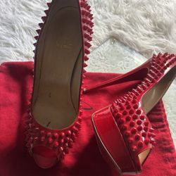 Louboutin Red Bottoms  Authentic 