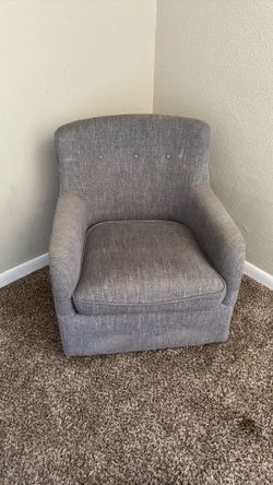 Grey swivel chair