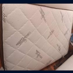 Full size bed and box spring and  frame eith wheels