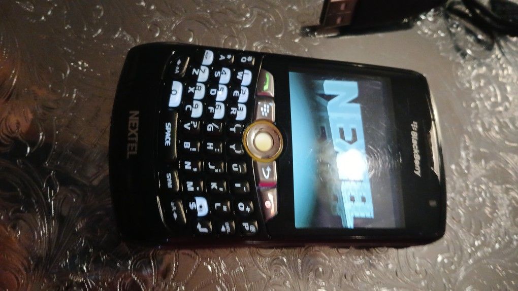 2 BlackBerry Phones (1 Nextel Curve. 2 BlackBerry Torch)