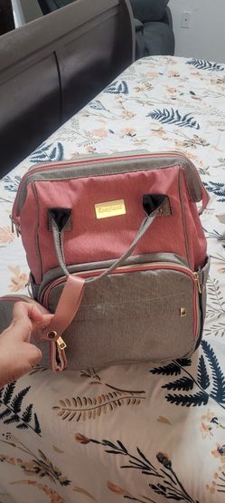 Diaper bag And Portable Changing Pad