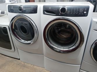 Electrolux front load washer and dryer set on pedestals - Free delivery