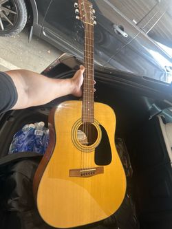 Acoustic fender guitar and fender amp