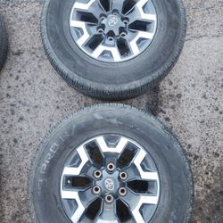 4 Rims for toyota tacoma come whit tires