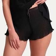 Black pleated slip shorts with bow detail size M