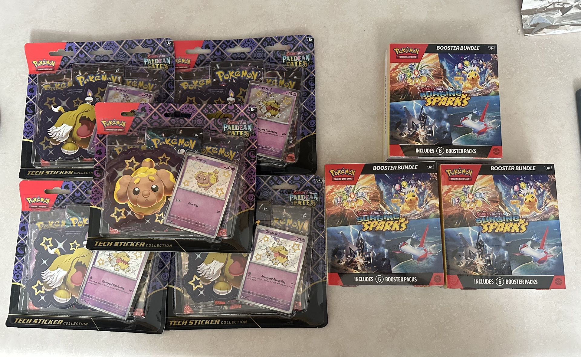 Pokemon Paldean Fates and Surging Sparks